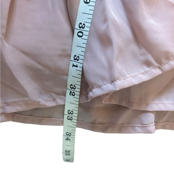 Wild Blue Sadie Robertson Blush
Pink Dress With Ruffled Detail Tie
Waist size S - Picture 6 of 8